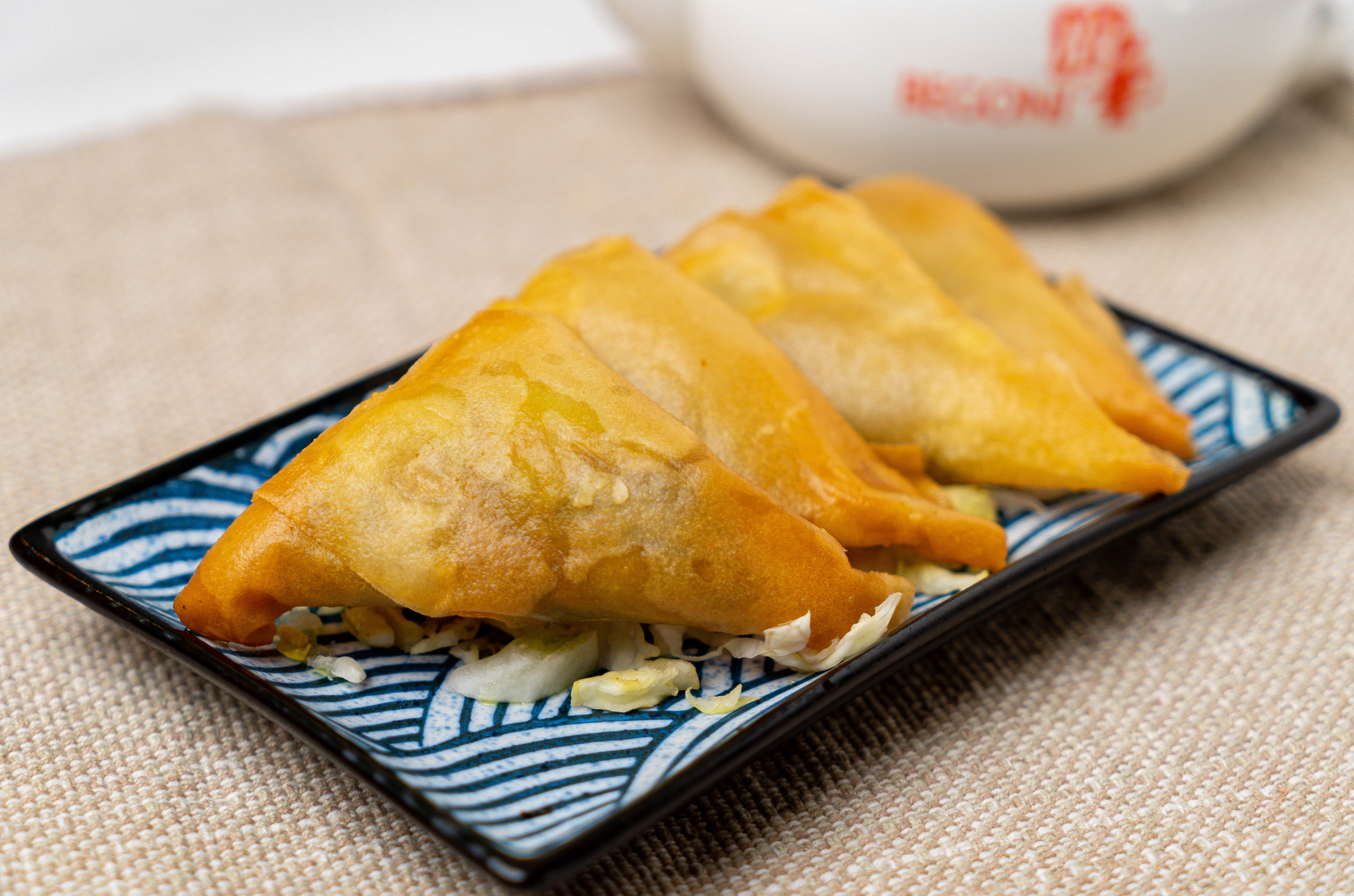 Order CT10. Deep Fried Curry Samosa (4) food online from Begoni Bistro store, San Francisco on bringmethat.com