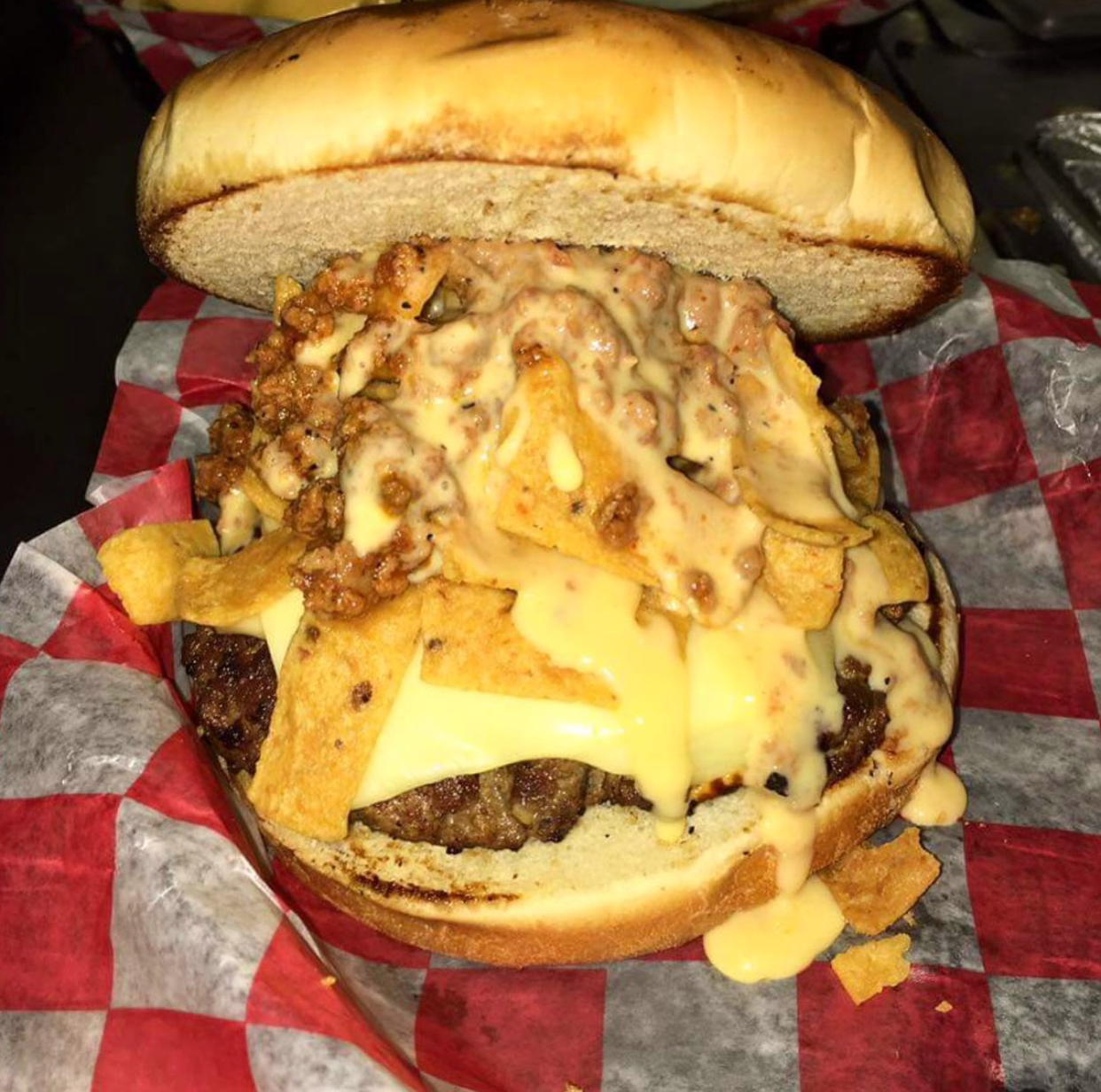 Order Frito Pie Burger (1/2 lb.) food online from Ranch House Burgers II store, Mission on bringmethat.com