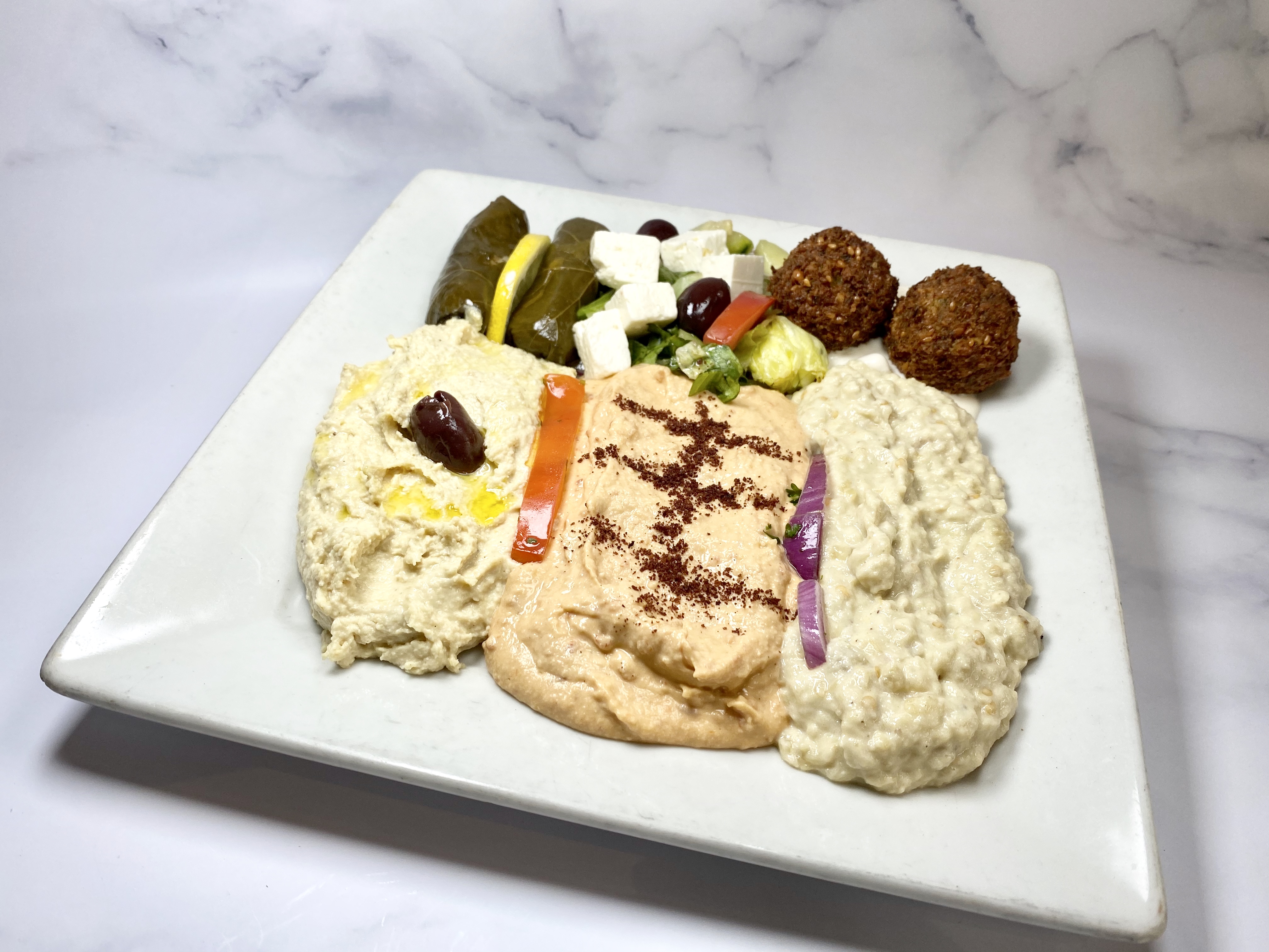 Order 8. Appetizer Combo Plate food online from Gyros Gyros store, Palo Alto on bringmethat.com