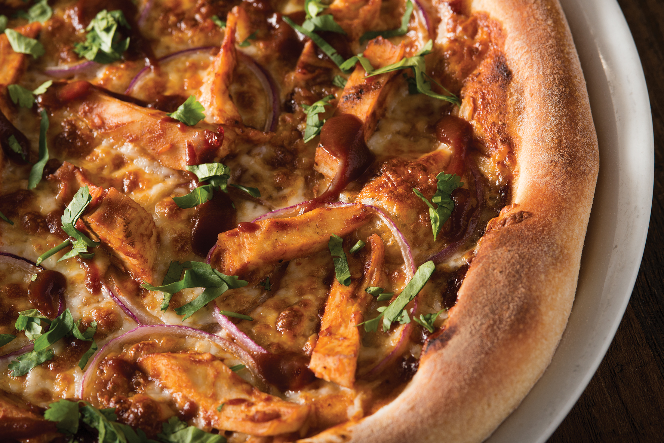 Order The Original BBQ Chicken Pizza food online from California Pizza Kitchen - River City Dr store, Jacksonville on bringmethat.com