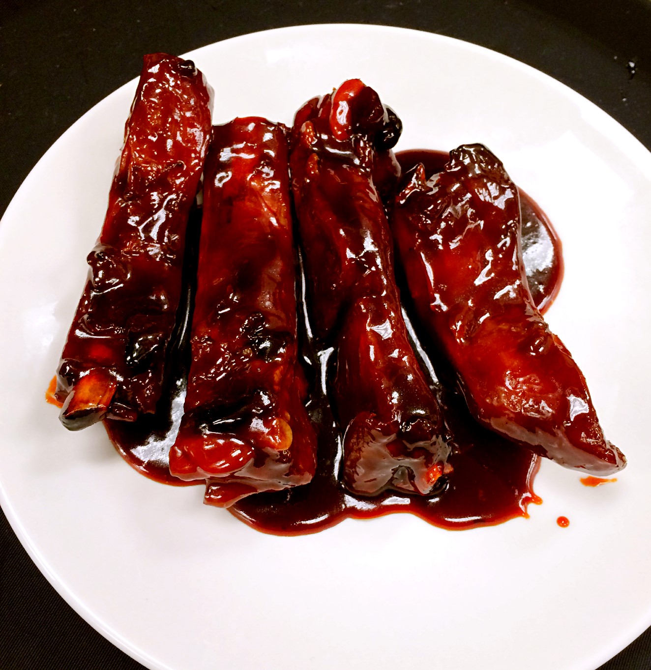Order 5. 4 BBQ Ribs food online from Star Wok Asian Bistro store, Cypress on bringmethat.com