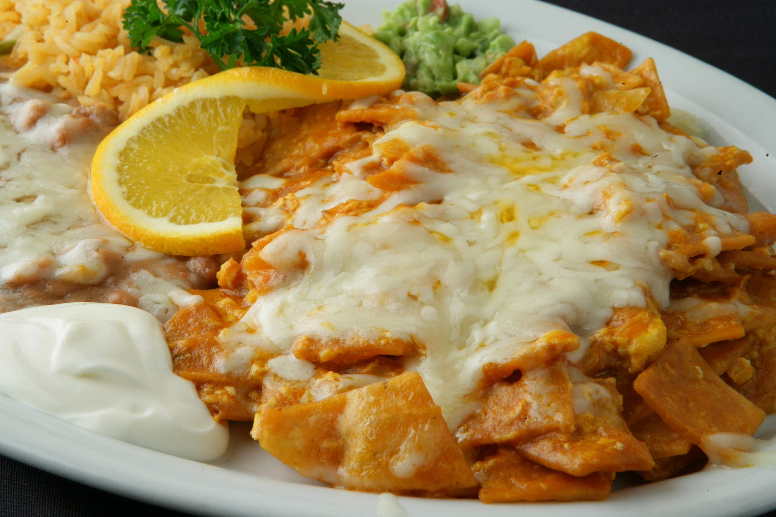 Order #10. Red Chilaquiles combo food online from Chapala Mexican Restaurant store, Brentwood on bringmethat.com