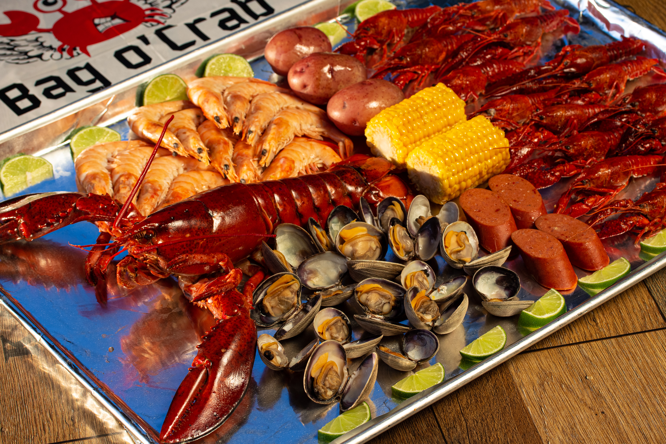 Order C4. Lobster Combo Or Dungeness Crab Combo food online from Bag O Crab store, Merced on bringmethat.com