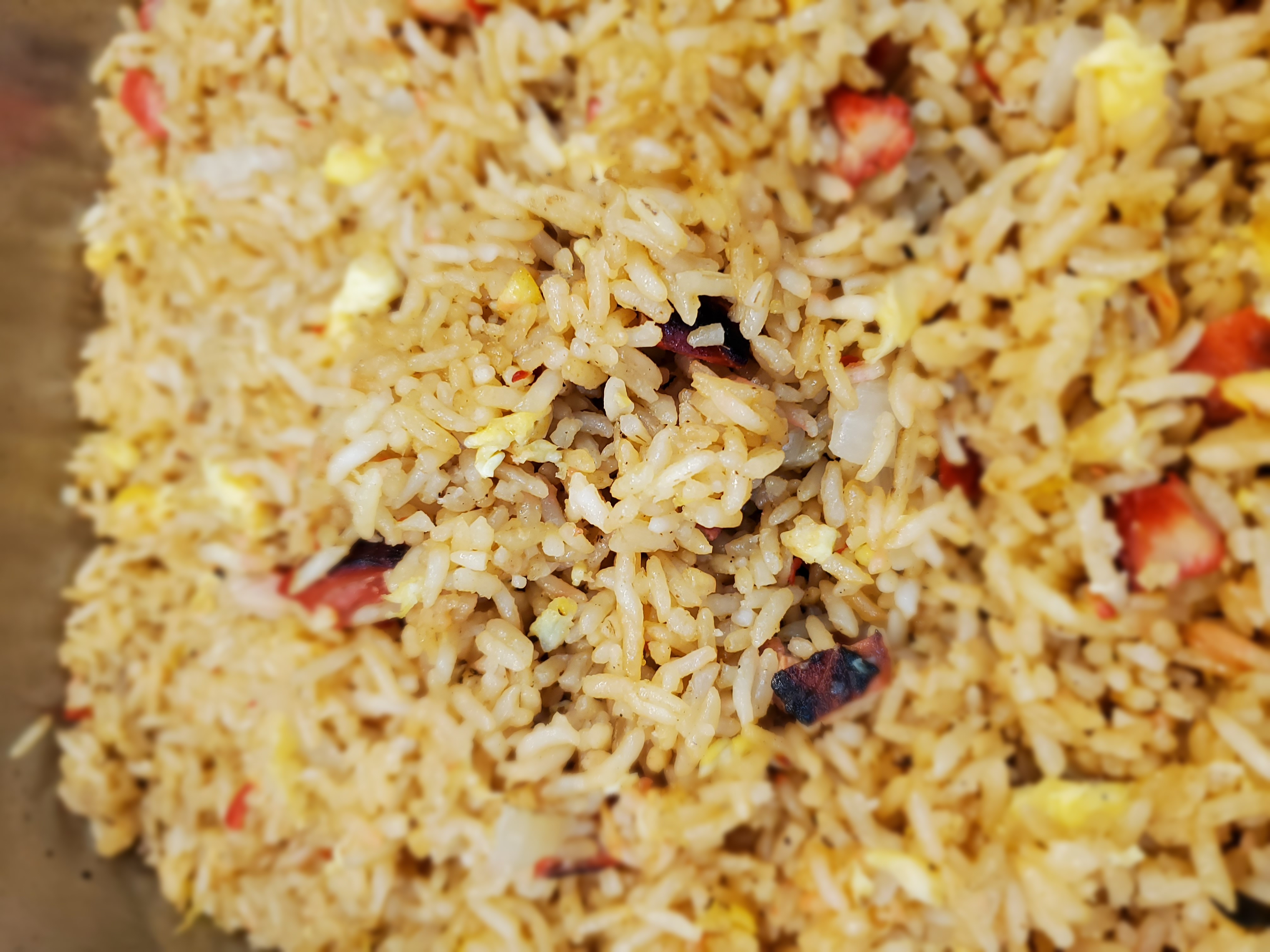 Order Pork Fried Rice food online from 5th Avenue Deli store, Anchorage on bringmethat.com