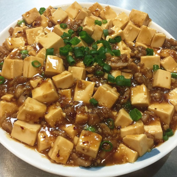 Order 64. Ma Pu Tofu with Pork food online from China One store, Moreno Valley on bringmethat.com