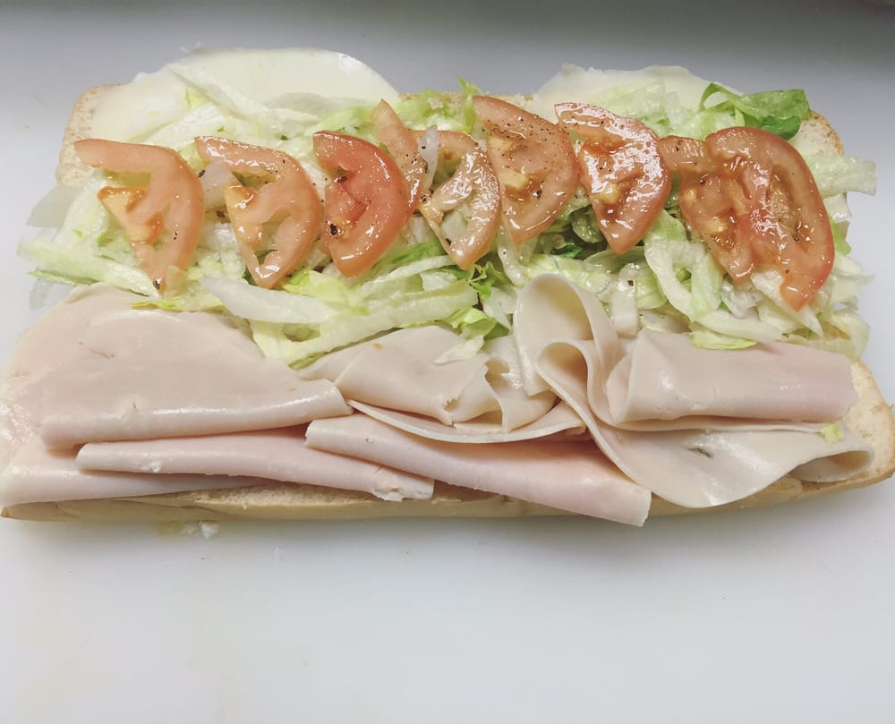 Order Turkey Sub food online from Ameci Pizza & Pasta store, Fountain Valley on bringmethat.com