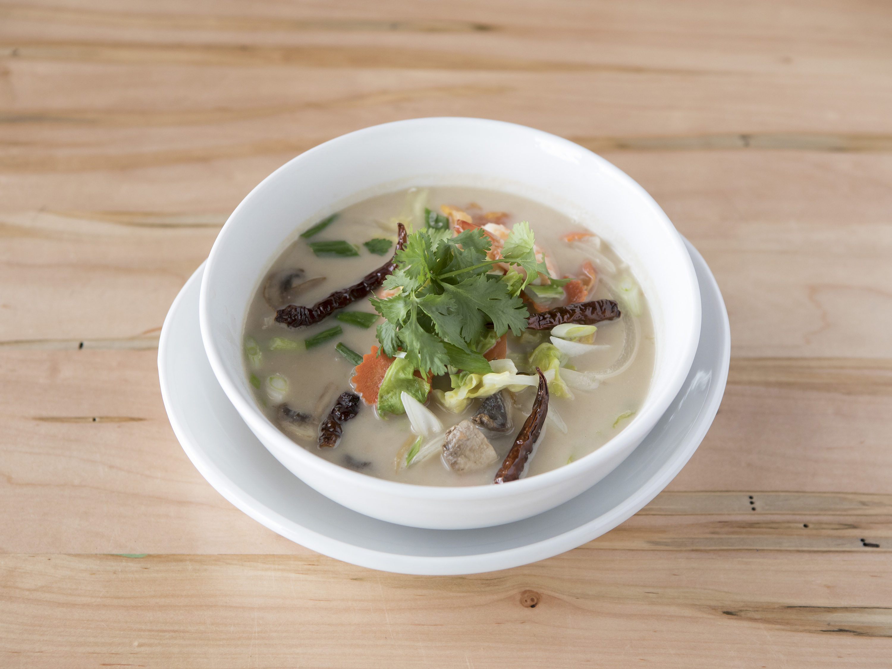 Order S2. Tom Kha Soup food online from Tokyo Bangkok store, Albuquerque on bringmethat.com