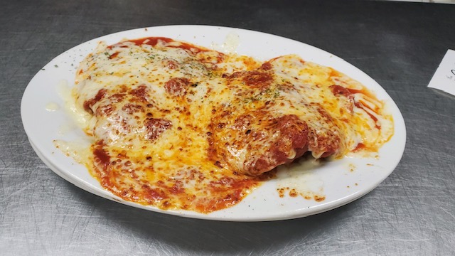 Order Veal Parmigiana food online from Lido Restaurant store, Hackensack on bringmethat.com
