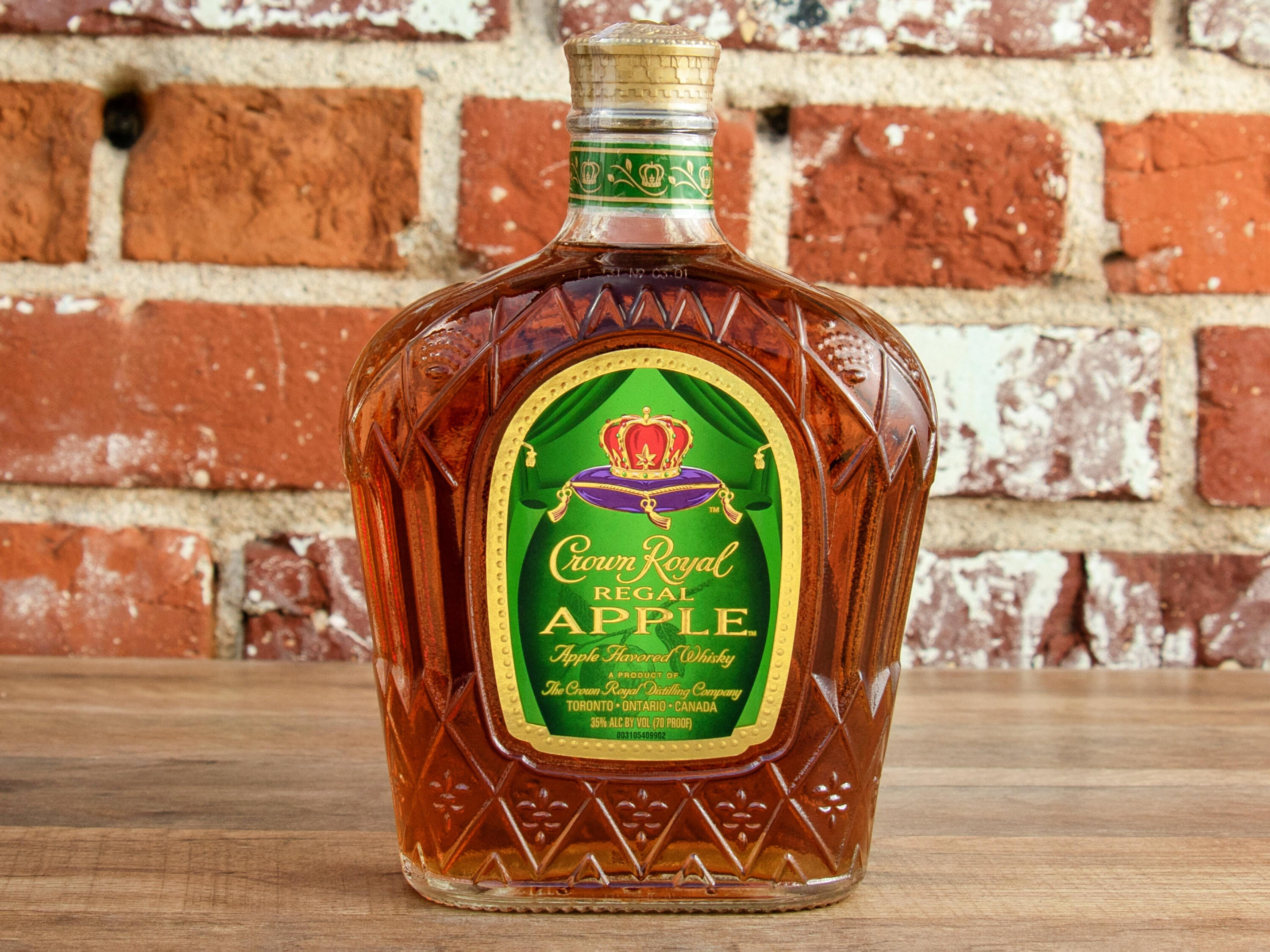 Order 750 ml. Crown Royal Apple Whiskey food online from Big John Liquor store, Long Beach on bringmethat.com