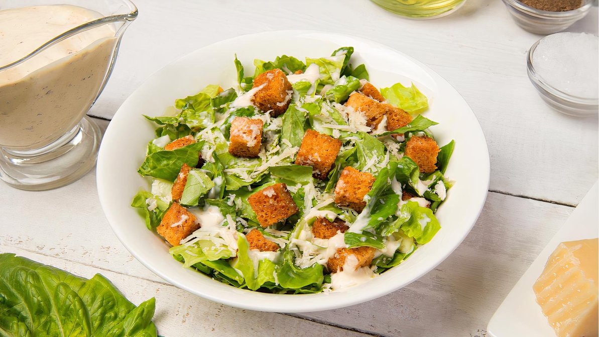 Order FP's Caesar Salad food online from Fire Pizza store, Arlington Heights on bringmethat.com