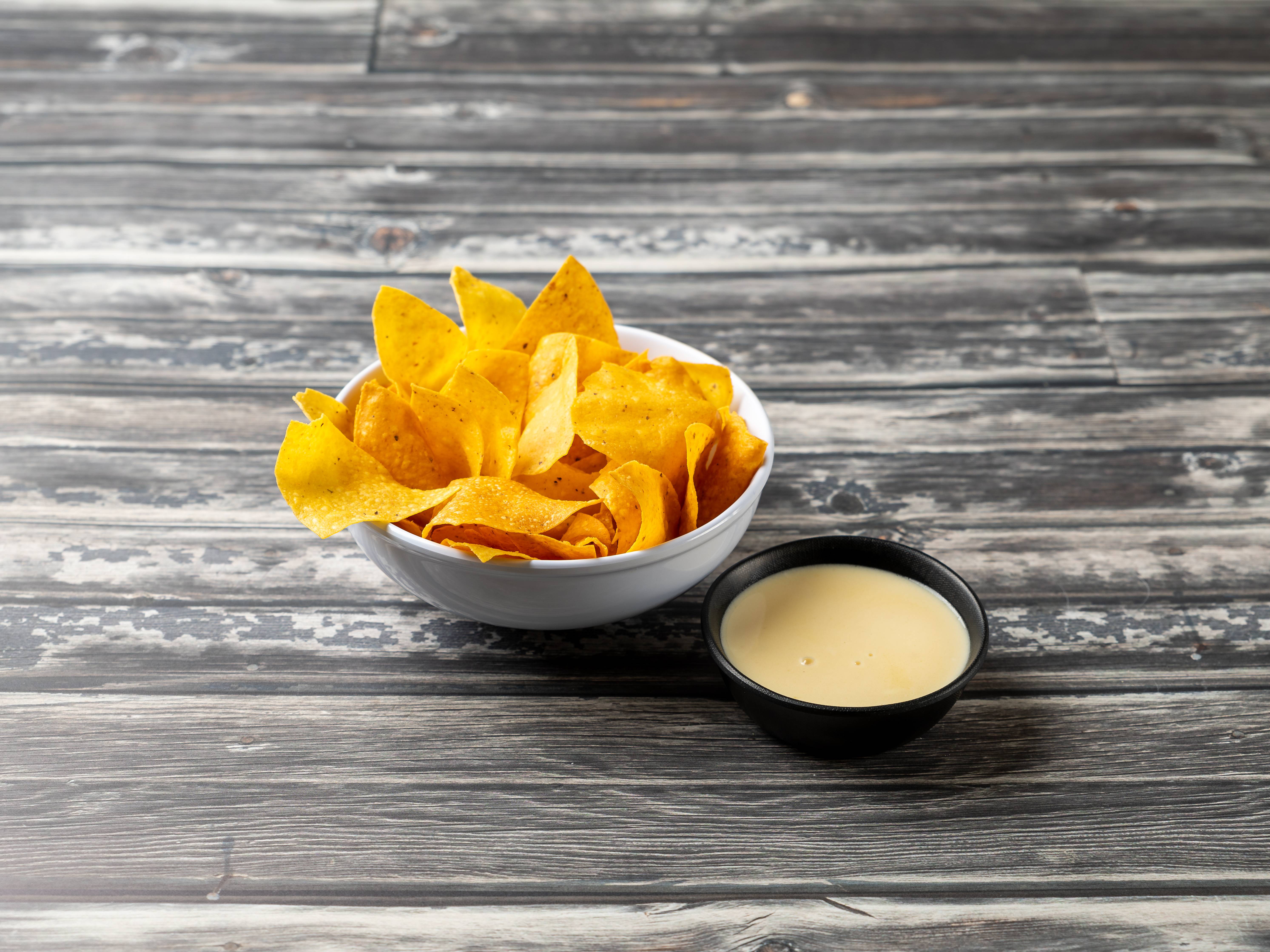 Order Chips and Queso food online from Taco Town store, Pittsburgh on bringmethat.com