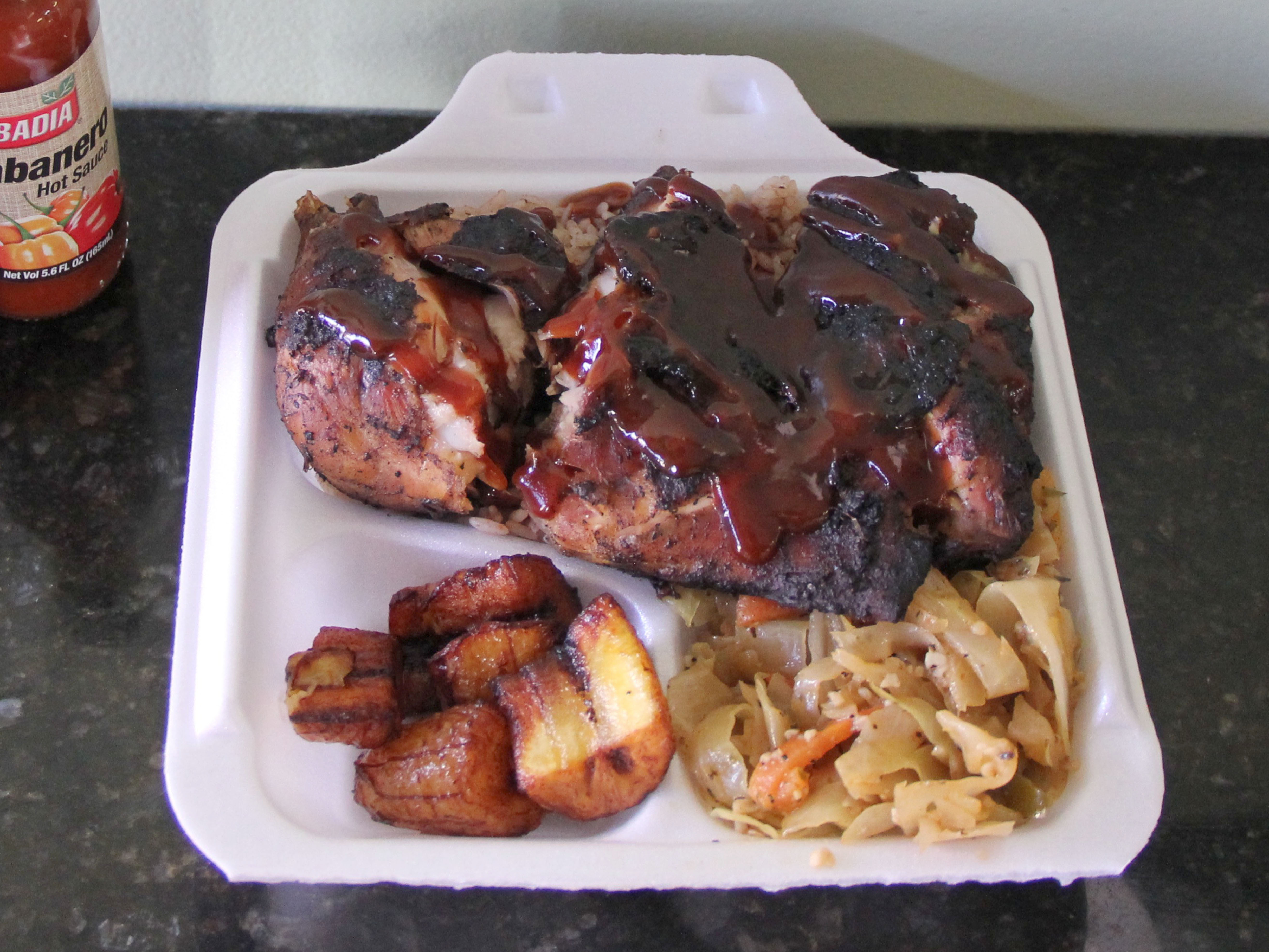 Order BBQ Jerk Chicken food online from Uncle Ralston's Jamaican Homestyle Cooking store, Freehold on bringmethat.com