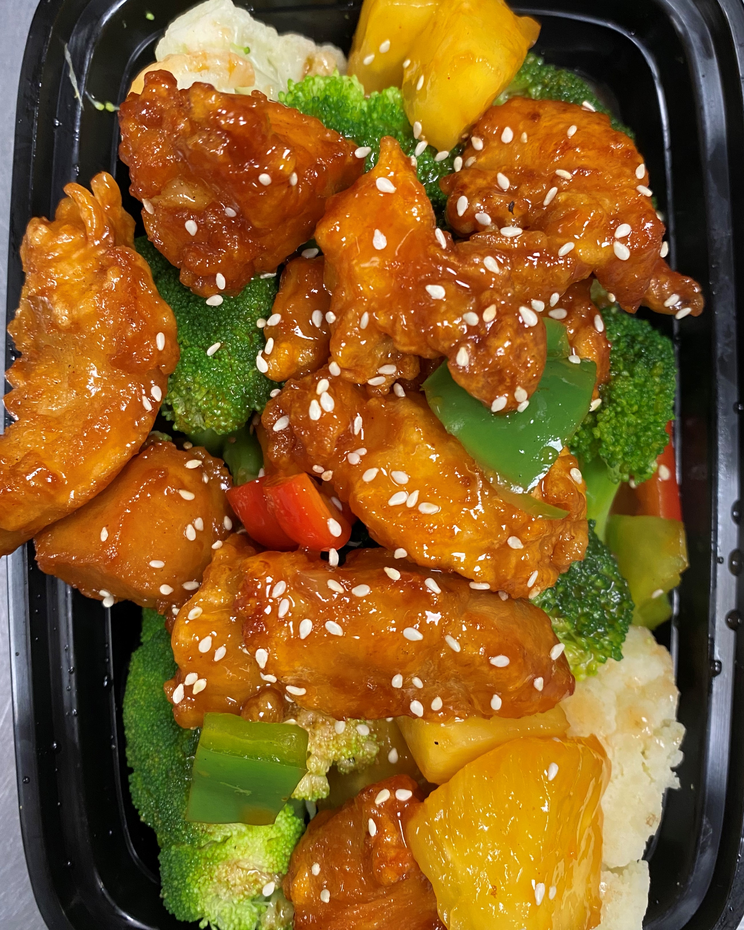 Order Sesame Chicken food online from Blossom Root Asian Cuisine store, New City on bringmethat.com