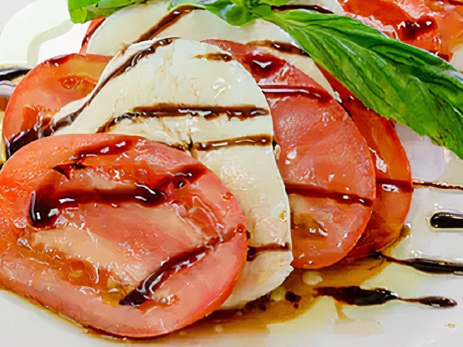 Order Caprese Salad food online from Alessio’s Cafe | Gelato | Pizza store, Hoboken on bringmethat.com
