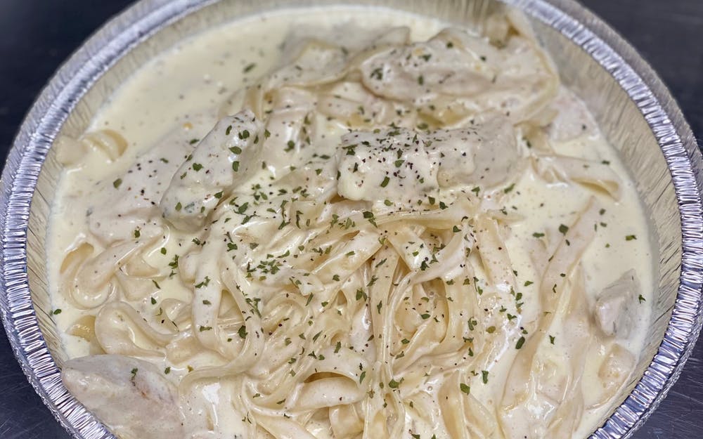 Order Fettuccine Alfredo with Grilled Chicken - Dinner food online from Three Brothers Italian Restaurant store, Bowie on bringmethat.com