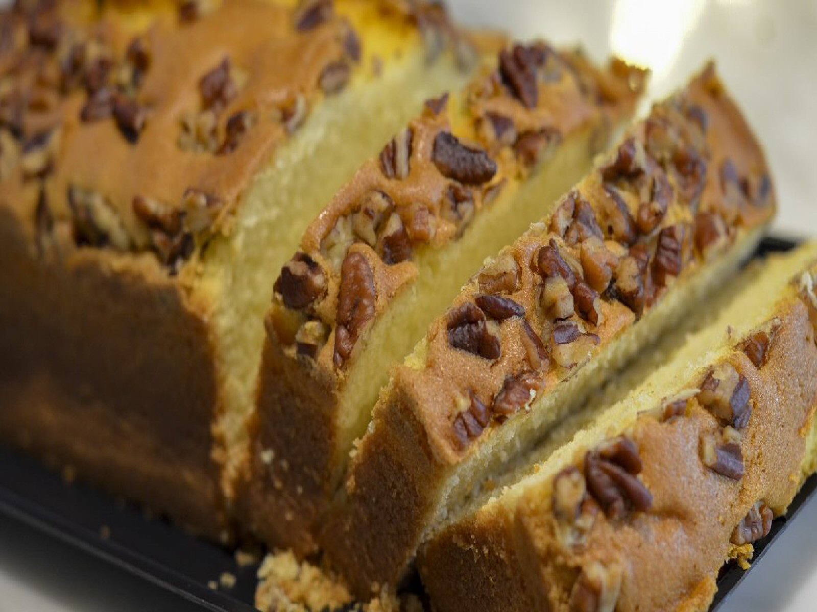 Order PANQUE DE NUEZ (WALNUTS AND BUTTER POUND CAKE)  food online from El Taco Chico store, Oak Park on bringmethat.com