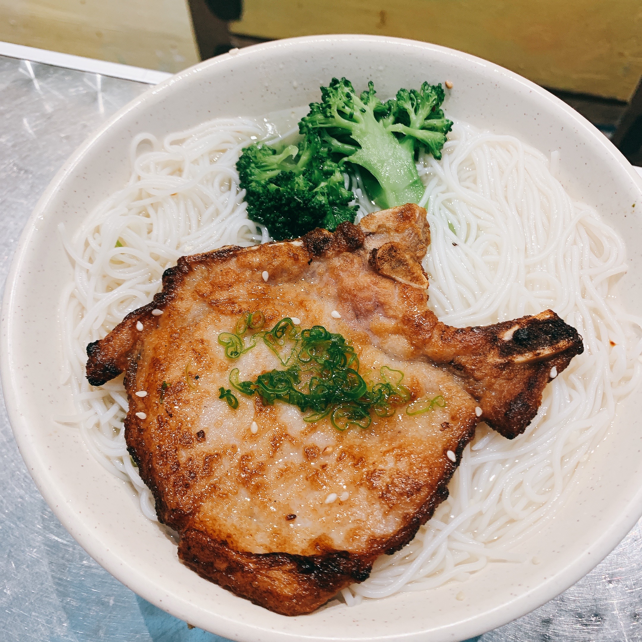 Order Pork Chop Noodle Soup  豬扒 food online from Dessert Republic -- Hong Kong Bistro store, San Mateo on bringmethat.com