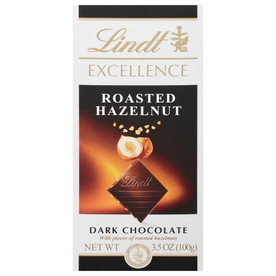 Order Lindt EXCELLENCE Roasted Hazelnut Dark Chocolate Bar, Dark Chocolate Candy with Roasted Hazelnut Pieces, 3.5 oz. Bar food online from Cvs store, PEARL on bringmethat.com