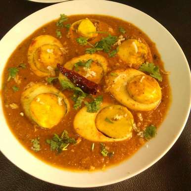 Order Curry - Egg Curry food online from Indian Street Cafe store, San Jose on bringmethat.com