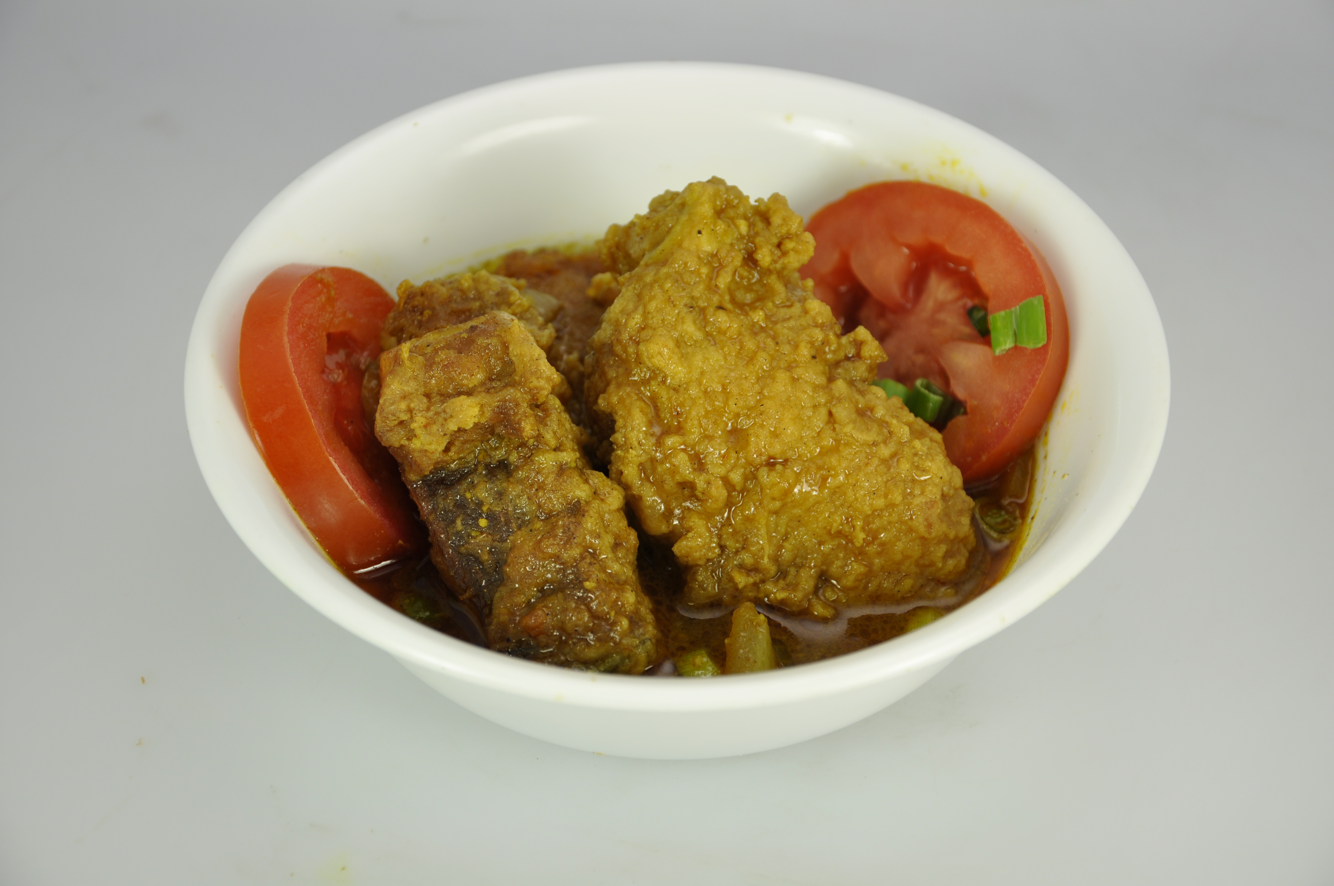 Order Curry Fish (Snapper) food online from Kaieteur Express Restaurant store, South Richmond Hill on bringmethat.com
