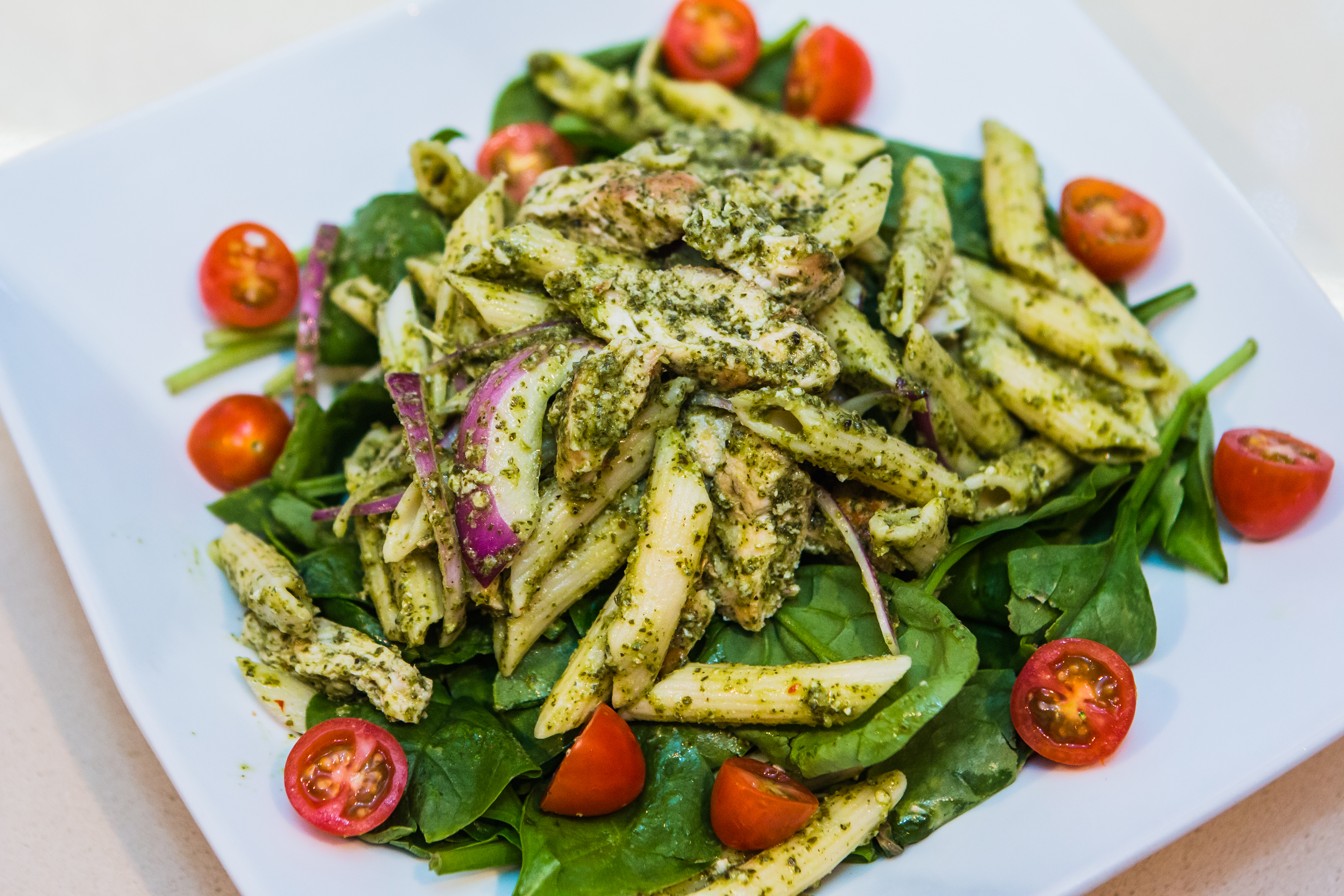 Order Chicken Pesto Salad food online from Panini Pizza & Italian Kitchen store, West Hollywood on bringmethat.com