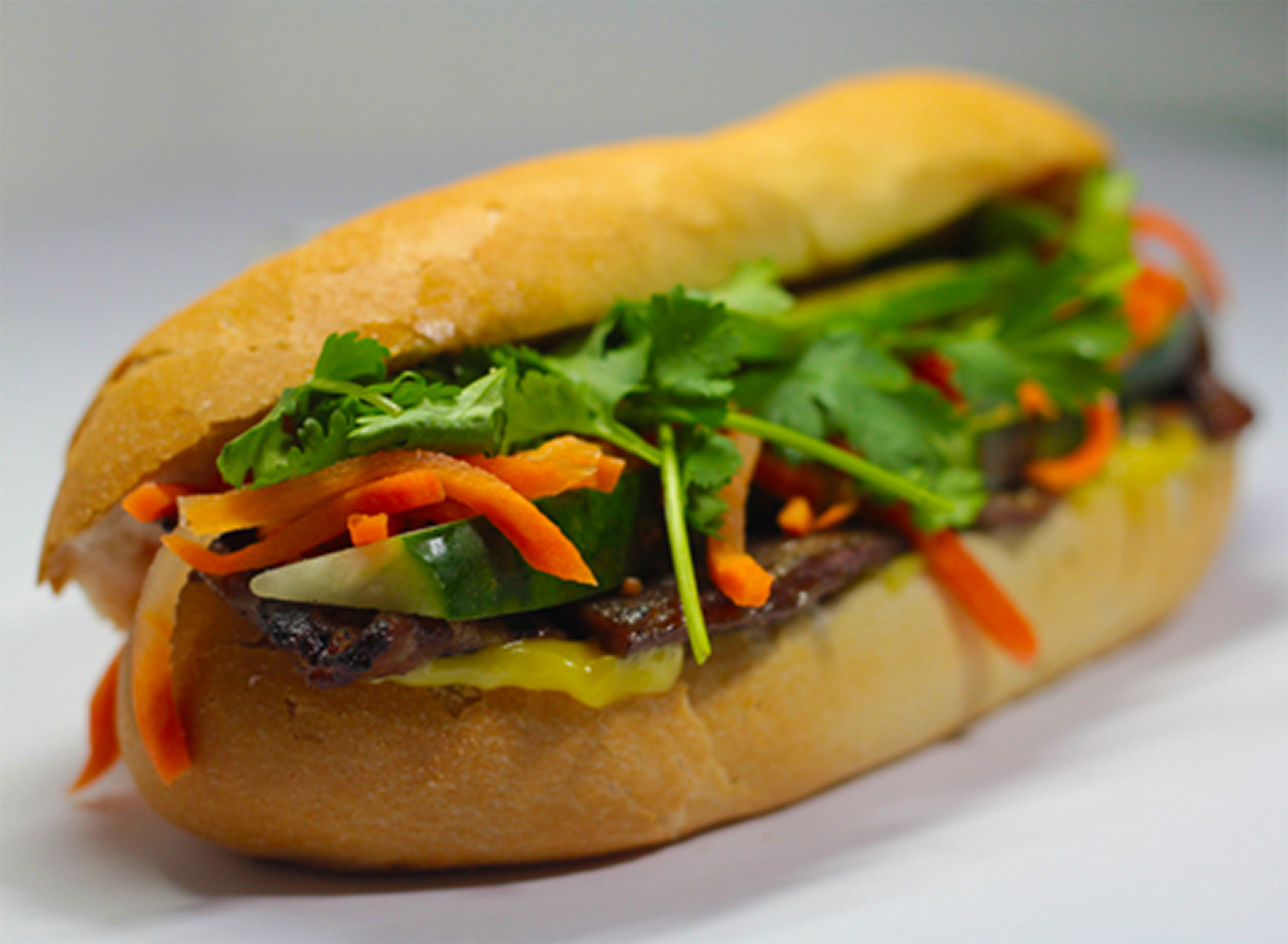 Order 75. Banh Mi Bo Nuong food online from Pho 21 Vietnamese Noodle House store, Houston on bringmethat.com