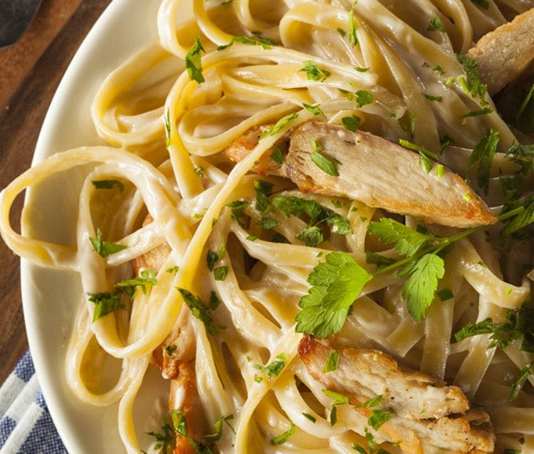 Order Chicken Fettuccine Alfredo Pasta - Pasta food online from The Royal Pizza store, Baltimore on bringmethat.com