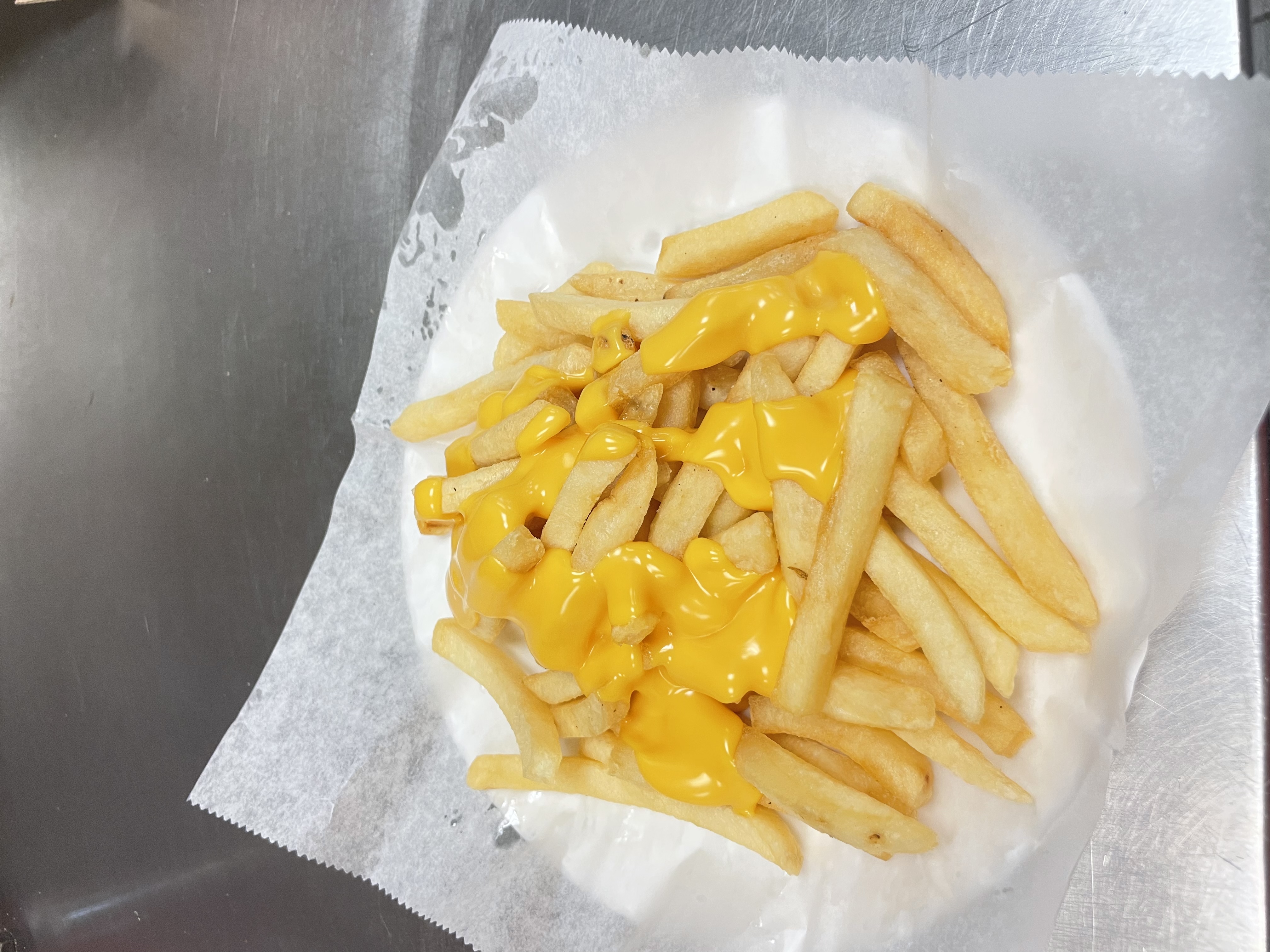 Order Cheese Fries food online from Dolce- carini store, Philadelphia on bringmethat.com