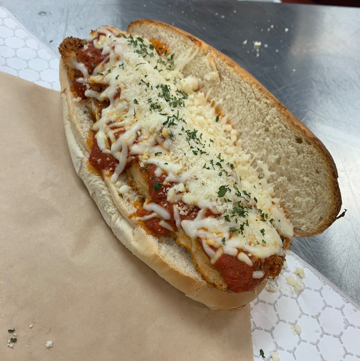 Order Chicken Parmesan Sub - Sandwich food online from Dolce To-Go store, Lake Havasu City on bringmethat.com