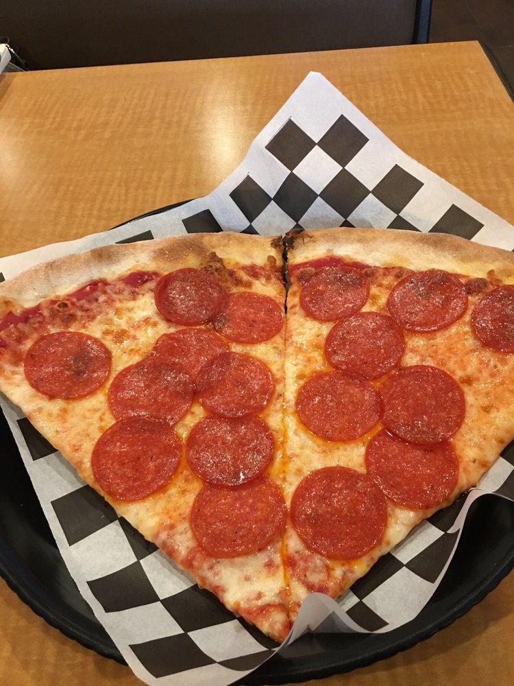 Order 2 pepperoni slices and 20oz bottle of soda food online from Little Italy Pizza store, New York on bringmethat.com