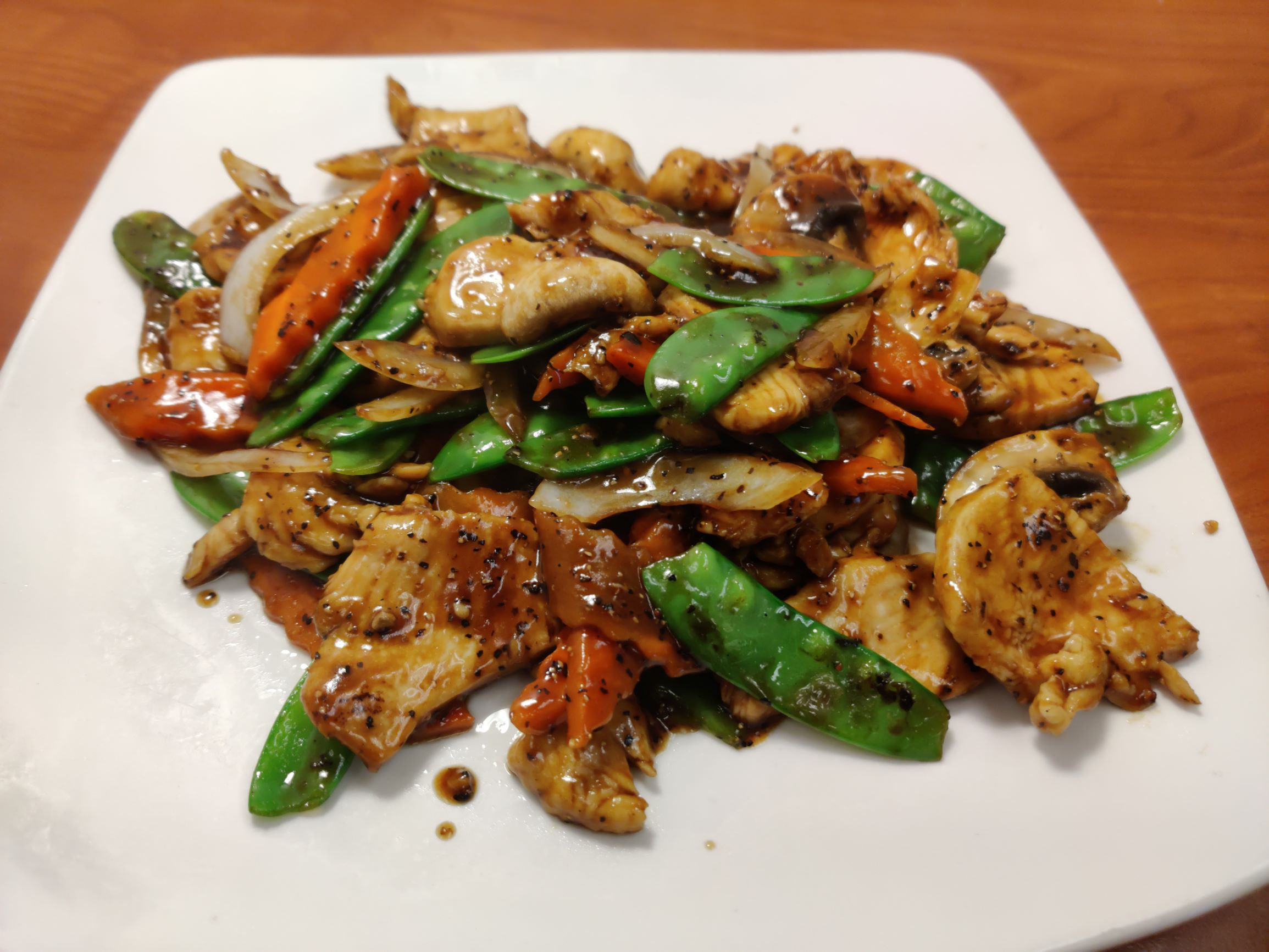 Order Black Pepper Chicken food online from Red Ginger China Bistro store, Saint Paul on bringmethat.com
