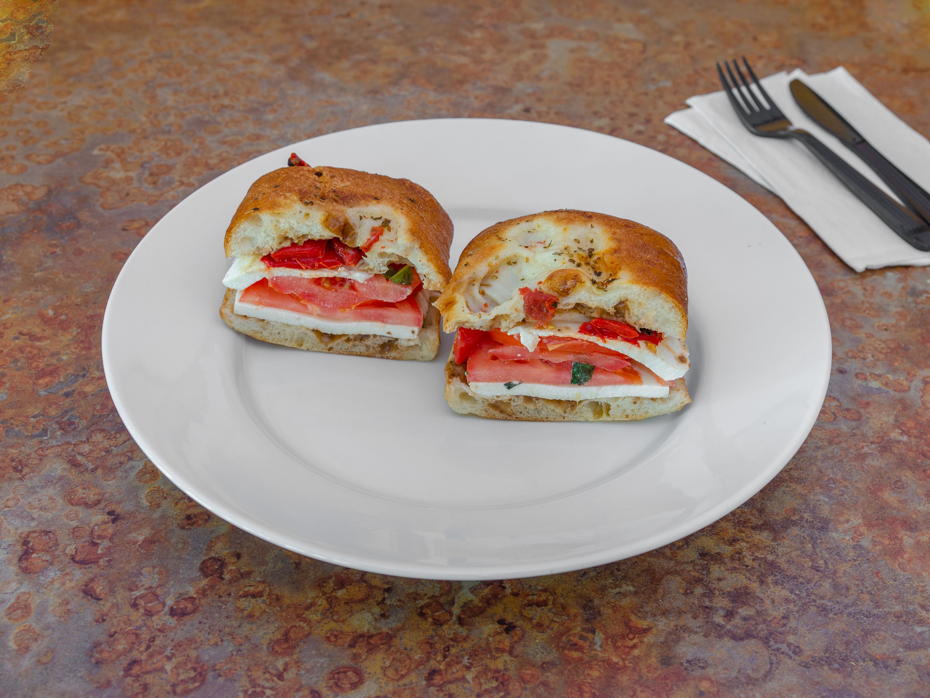 Order Plum Tomato and Mozzarella Sandwich food online from Suburban Eats store, Melville on bringmethat.com