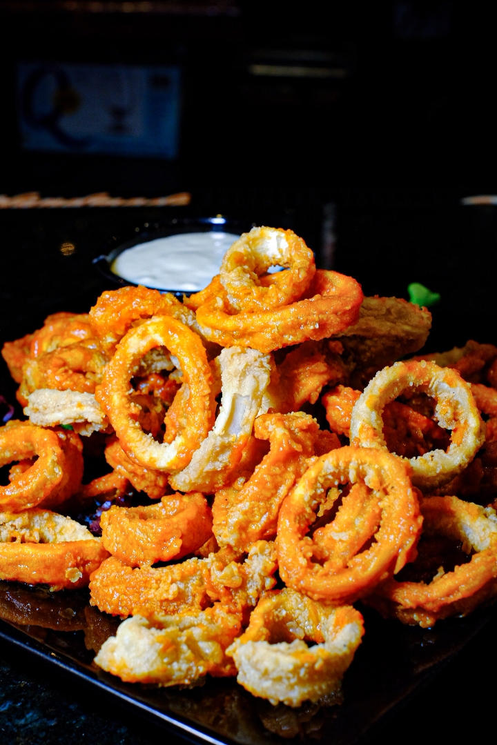 Order Buffalo Calamari food online from The Downtown Cafe store, Glen Cove on bringmethat.com