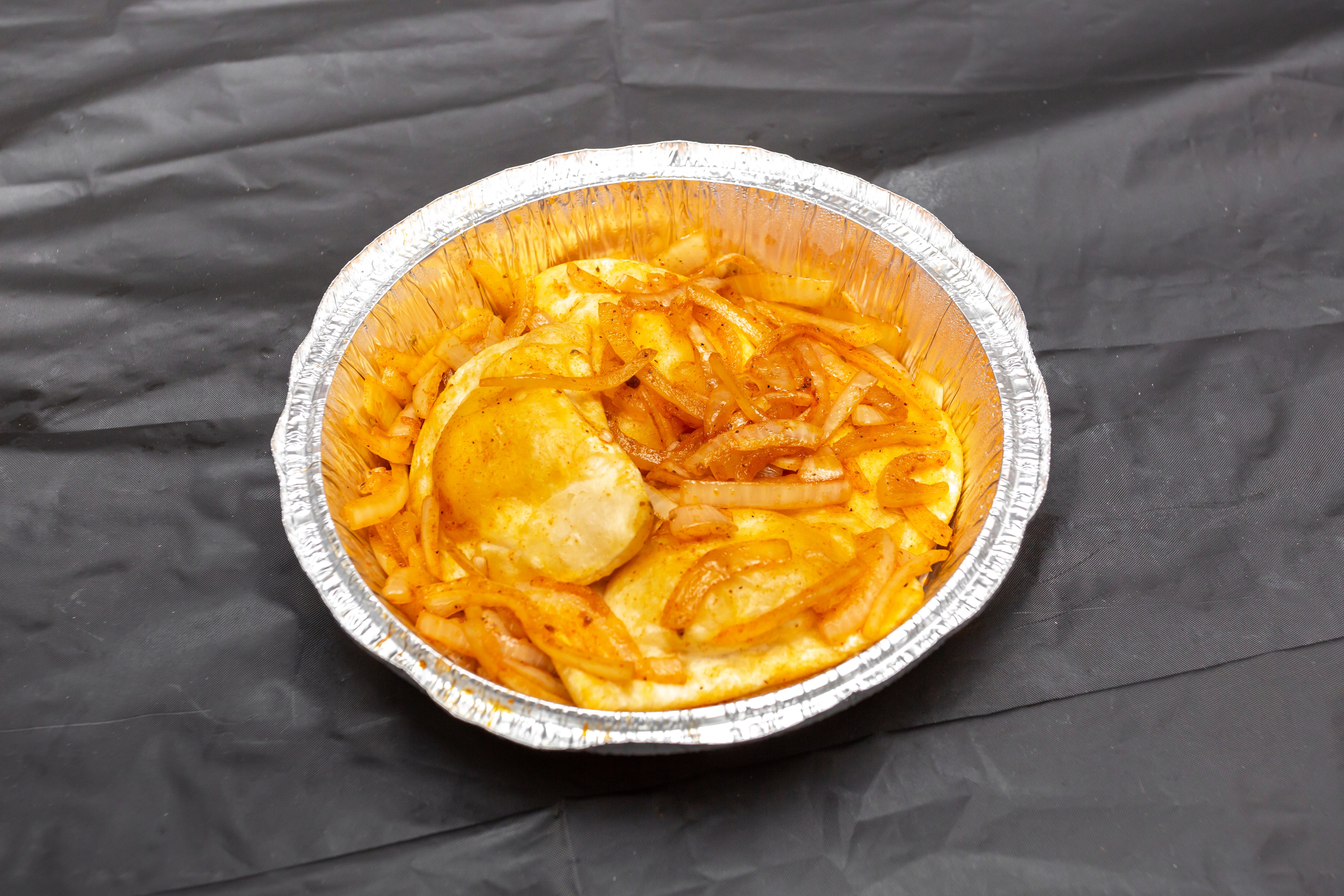 Order Pierogies with Sauteed Onions - 4 Pieces food online from Drake Pizza store, Allentown on bringmethat.com