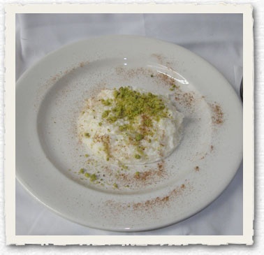 Order Riz B'halib food online from Tripoli Restaurant store, Brooklyn on bringmethat.com