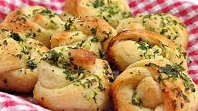 Order Garlic Knots - 6 Pieces food online from Pino Ii Pizzeria & Restaurant store, Nazareth on bringmethat.com