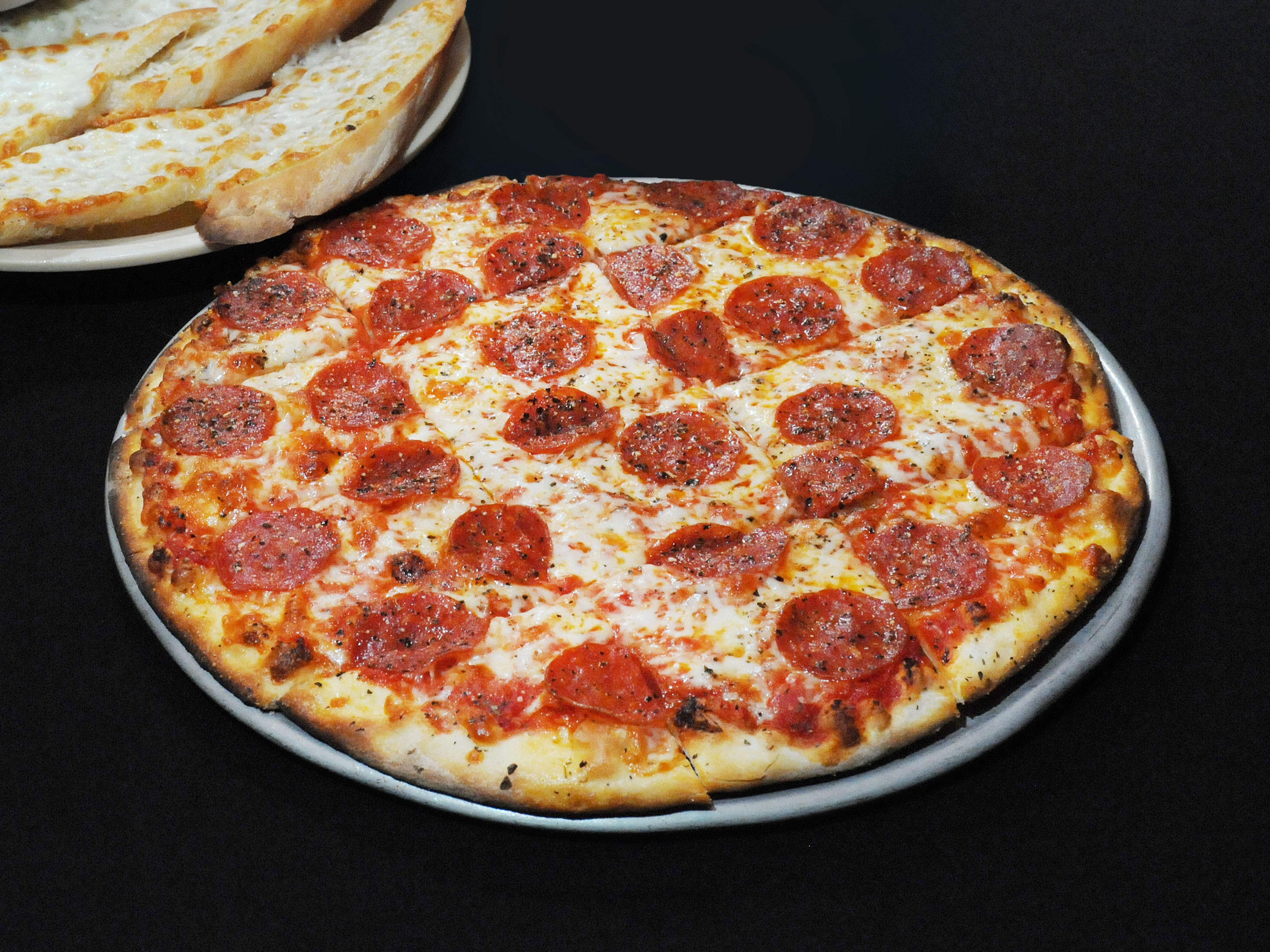 Order 1 Topping New York Thin Crust Pizza food online from Tomaso store, Marion on bringmethat.com