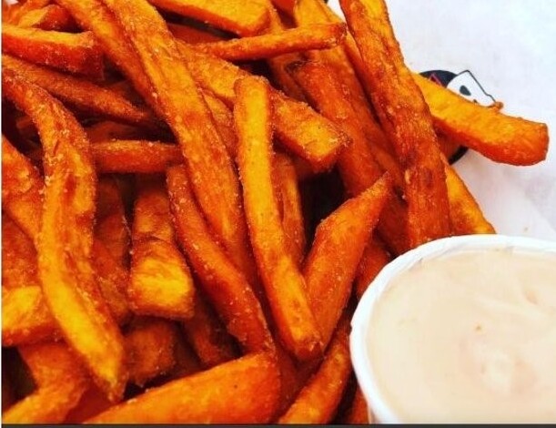 Order Sweet Potato Fries - Basket food online from Betty Burgers store, Aptos on bringmethat.com