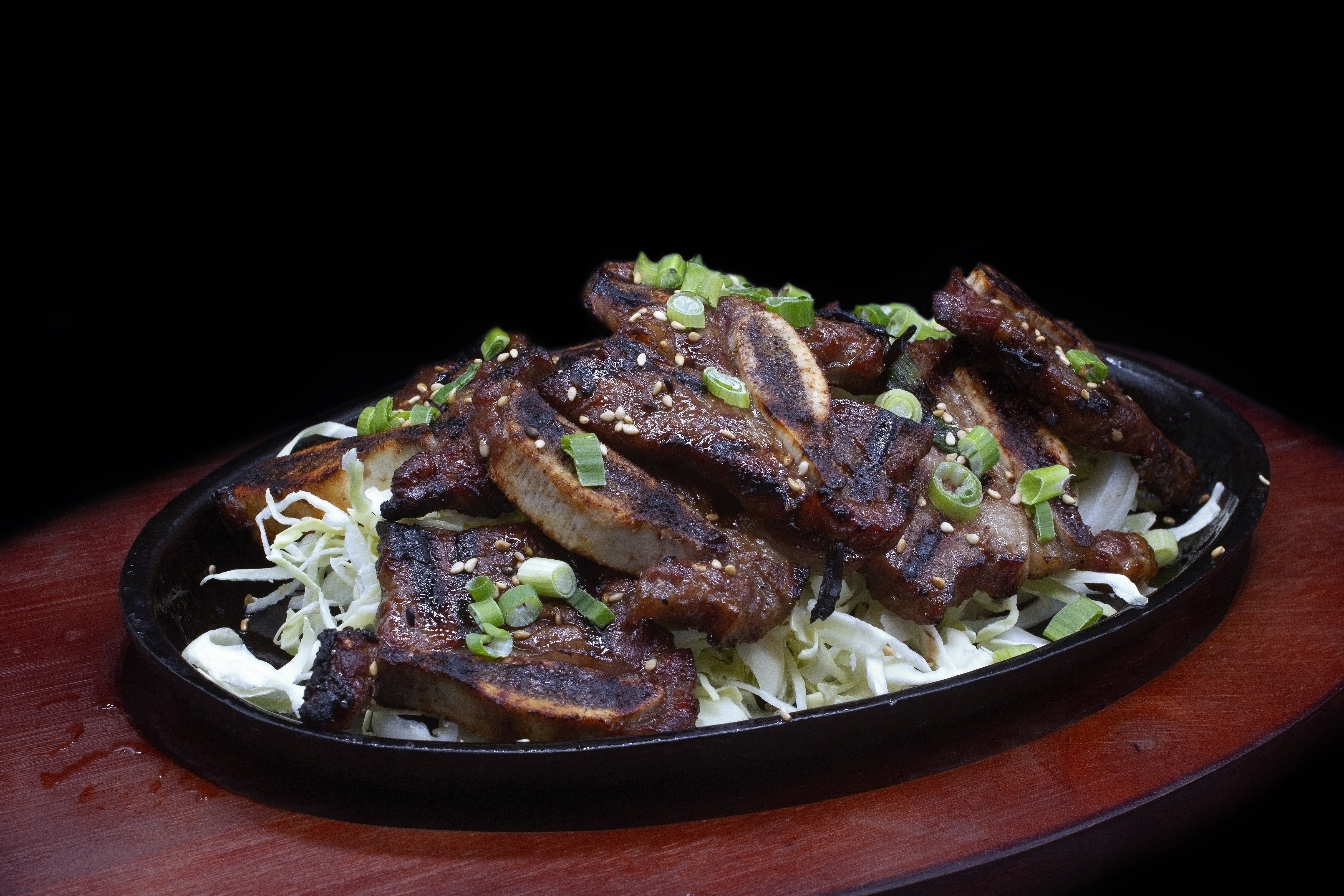 Order 56. Kalbi BBQ Short Ribs food online from Papa Sushi & Roll store, Covina on bringmethat.com
