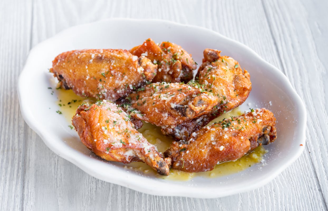 Order Jumbo Bone-In Wings - 6 Pieces food online from Tony Pizza & Restaurant store, Tatamy on bringmethat.com