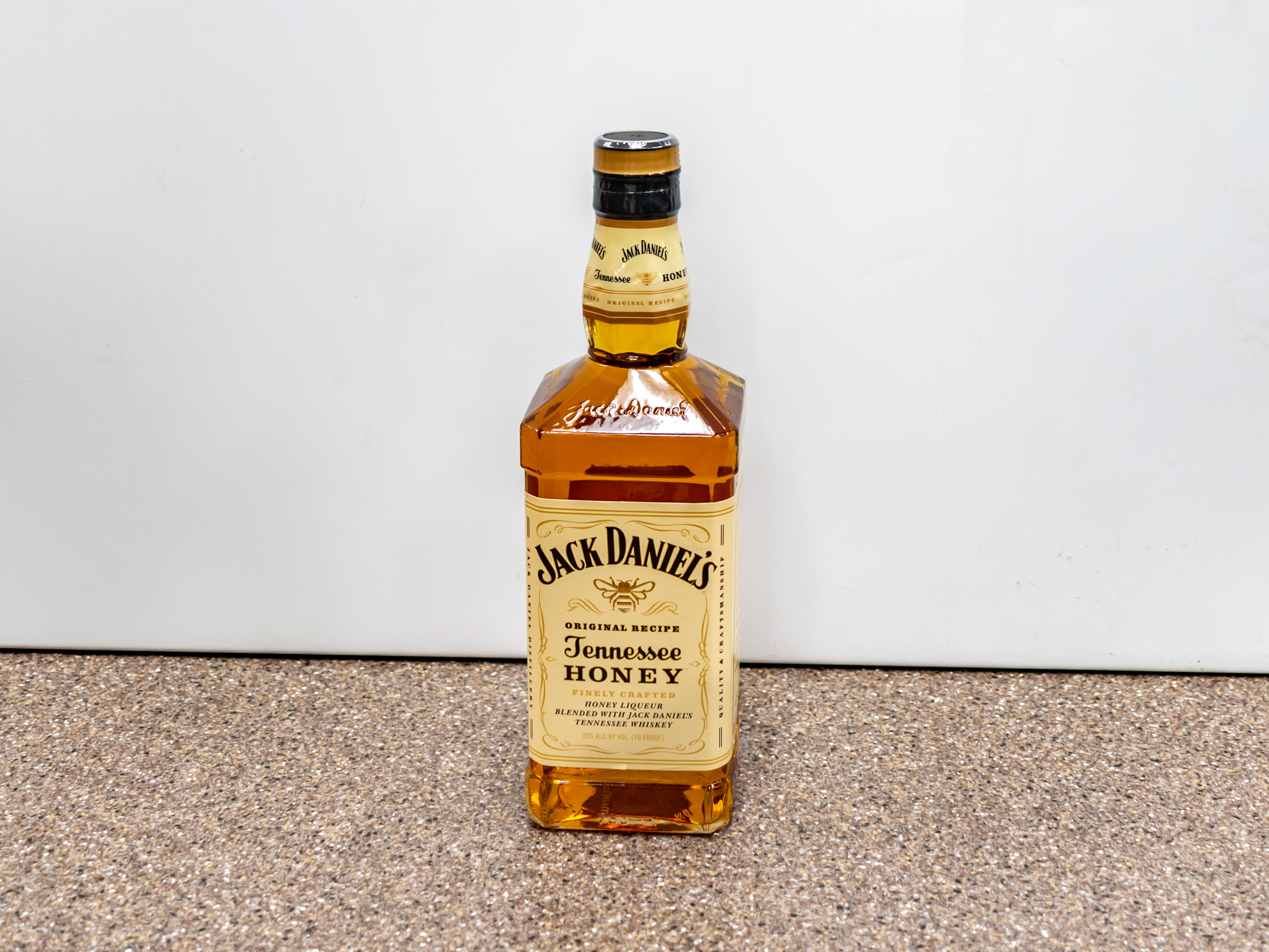 Order Jack Daniel's Tennessee Honey Whiskey, 750 ml food online from Kangaroo Food Mart store, Cathedral City on bringmethat.com