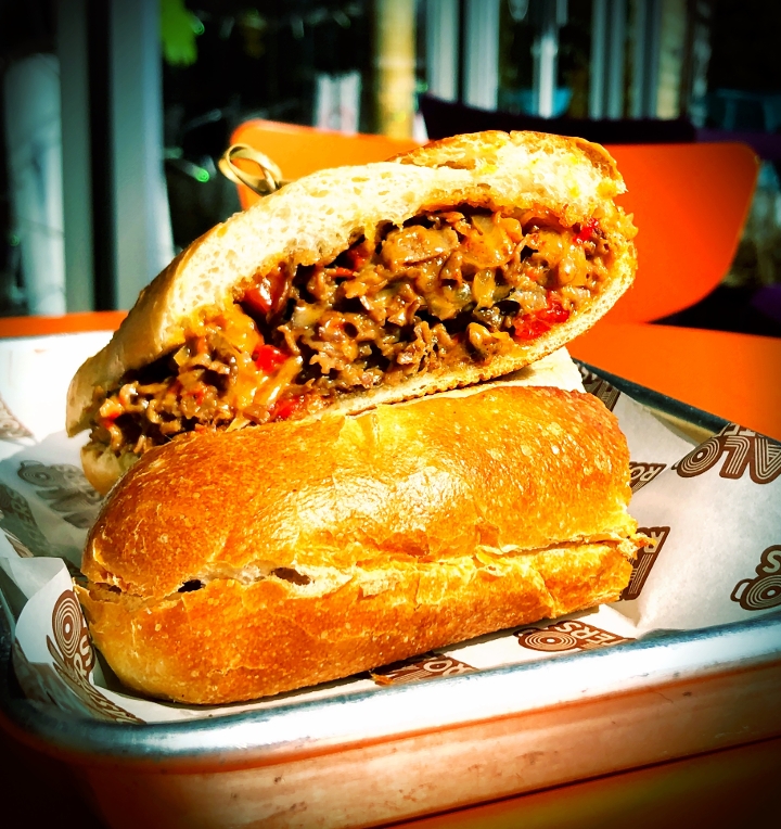 Order Roast Beef Philly Cheesesteak w/ chips food online from Halo Roasters store, Springfield on bringmethat.com