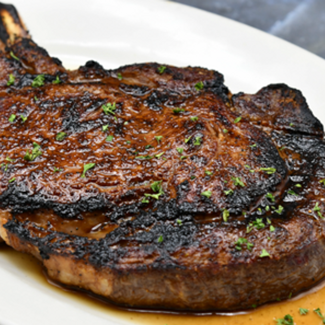 Order 22 oz. Prime Bone-In Ribeye food online from Morton The Steakhouse store, Chicago on bringmethat.com