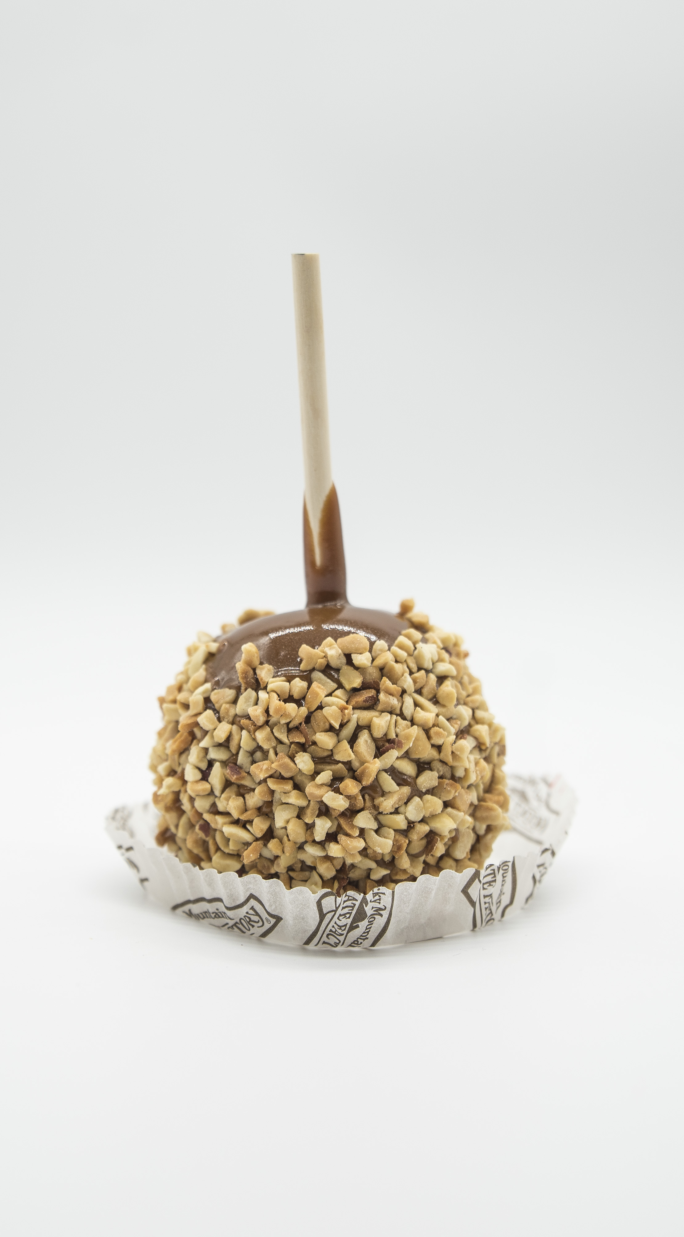 Order Peanut Caramel Apple food online from Rocky Mountain Chocolate Factory store, Fresno on bringmethat.com