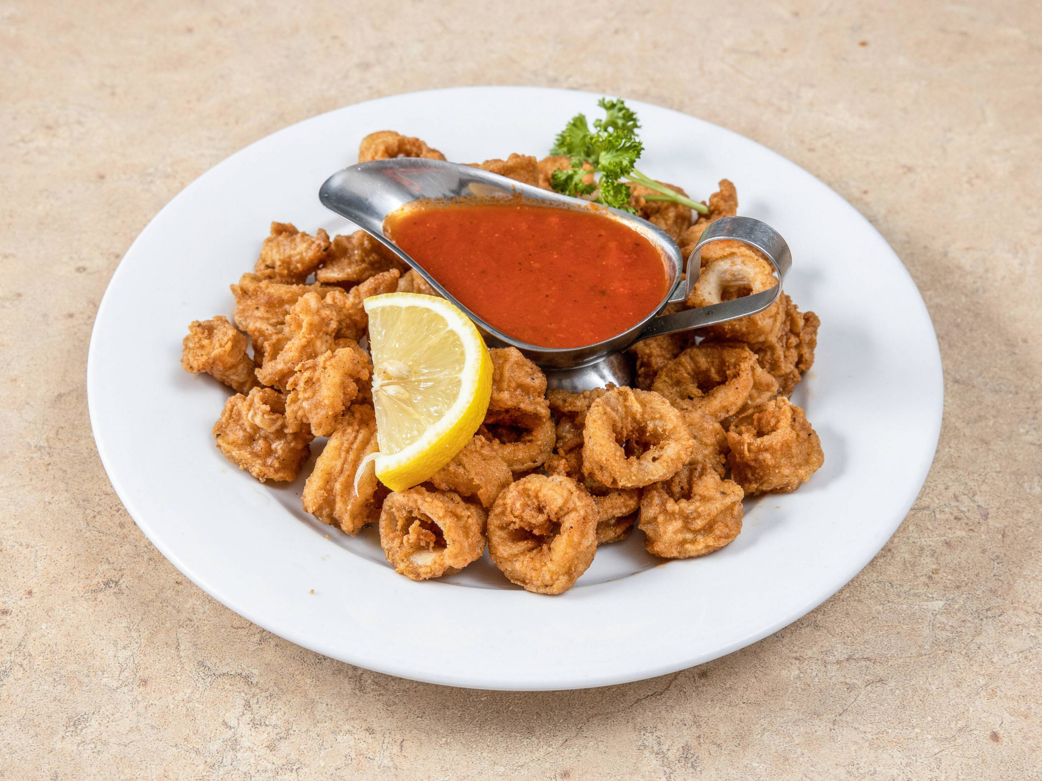 Order Fried Calamari food online from Frank's Trattoria store, Caldwell on bringmethat.com
