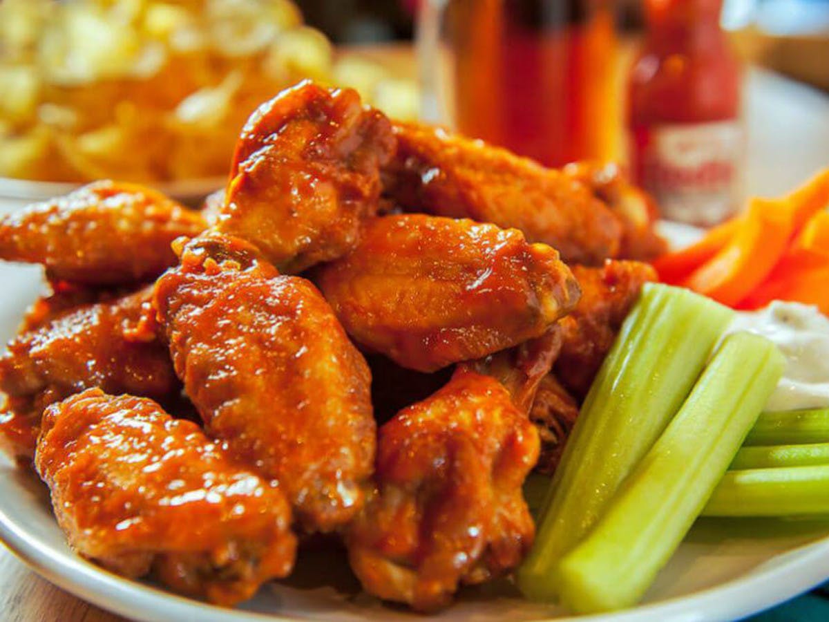 Order Traditional Wings - 10 Pieces food online from Bruno's Pizzeria store, Lakeside Marblehead on bringmethat.com