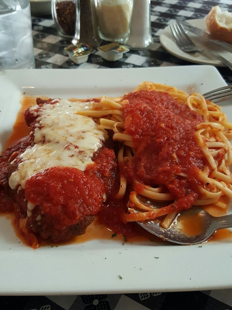 Order Chicken Parmigiana - Entree food online from Macaluso's Italian Restaurant store, Fort Worth on bringmethat.com