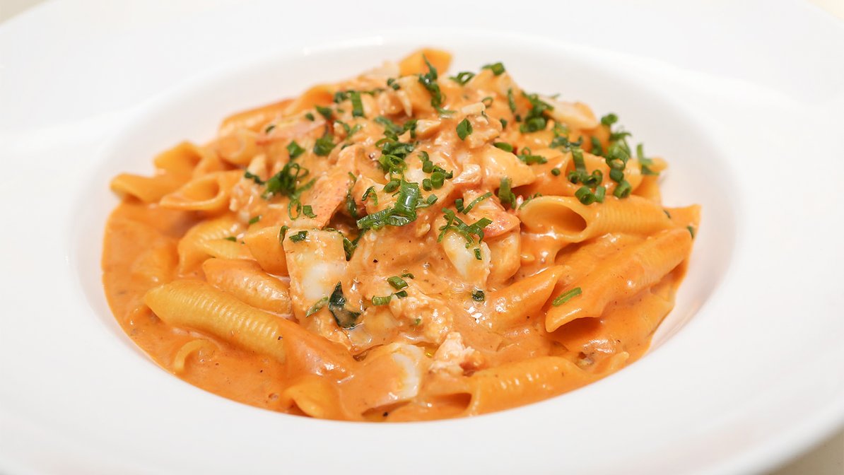 Order Garganelli with lobster bisque food online from Blue Seafood Bar store, New York on bringmethat.com