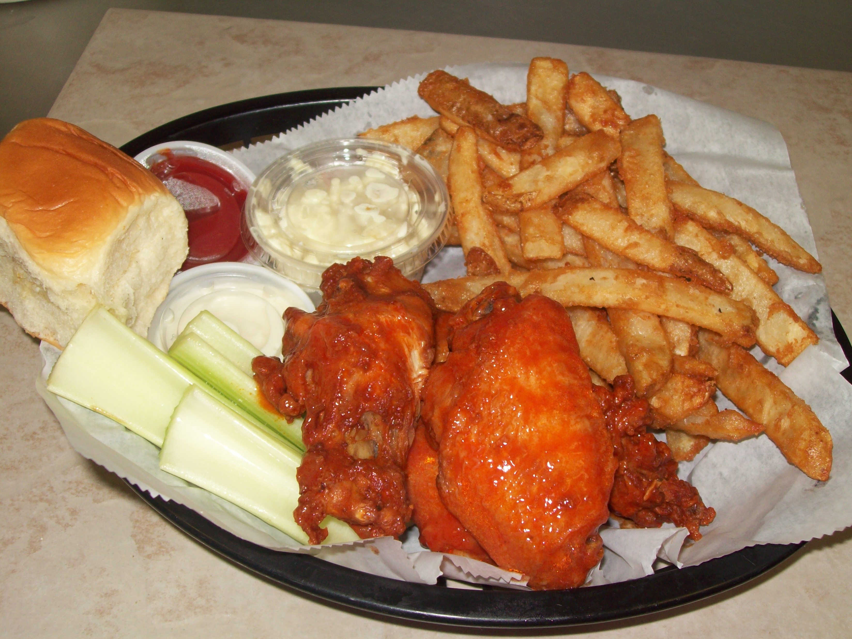 Order Wings Basket food online from Rinaldi Pizza & Sub Shop store, Marne on bringmethat.com