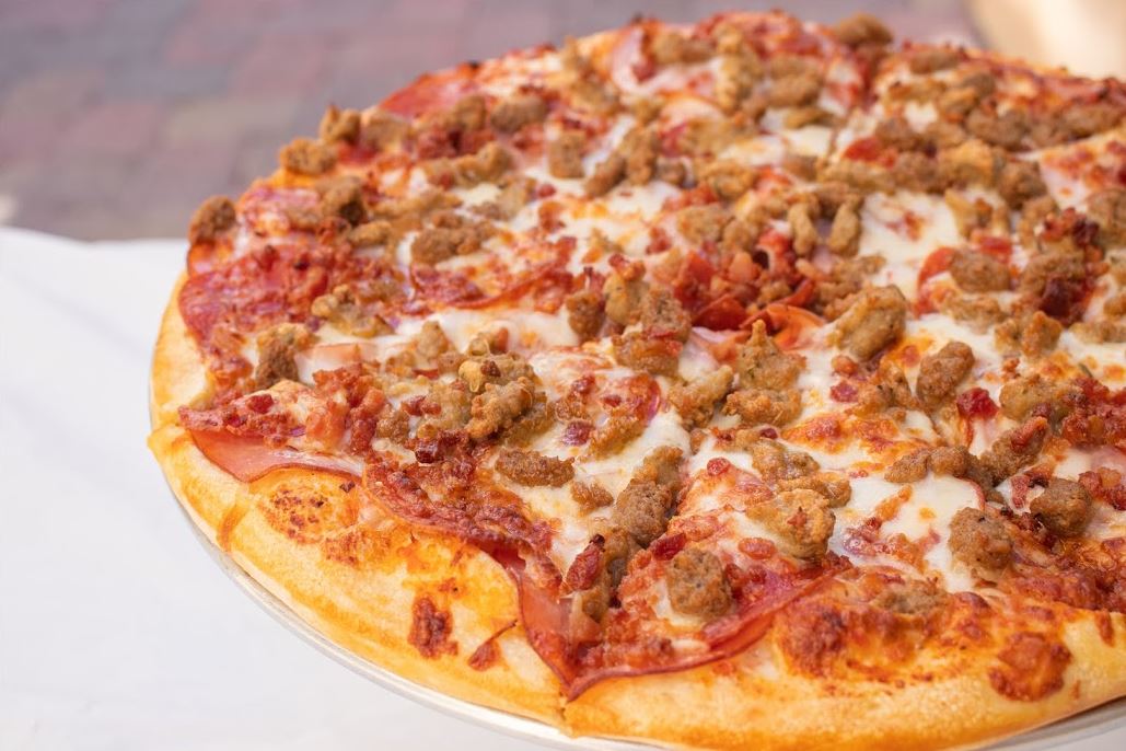 Order 5 Meat Specialty Pizza food online from 4 Eggs & Pizza store, Santa Barbara on bringmethat.com